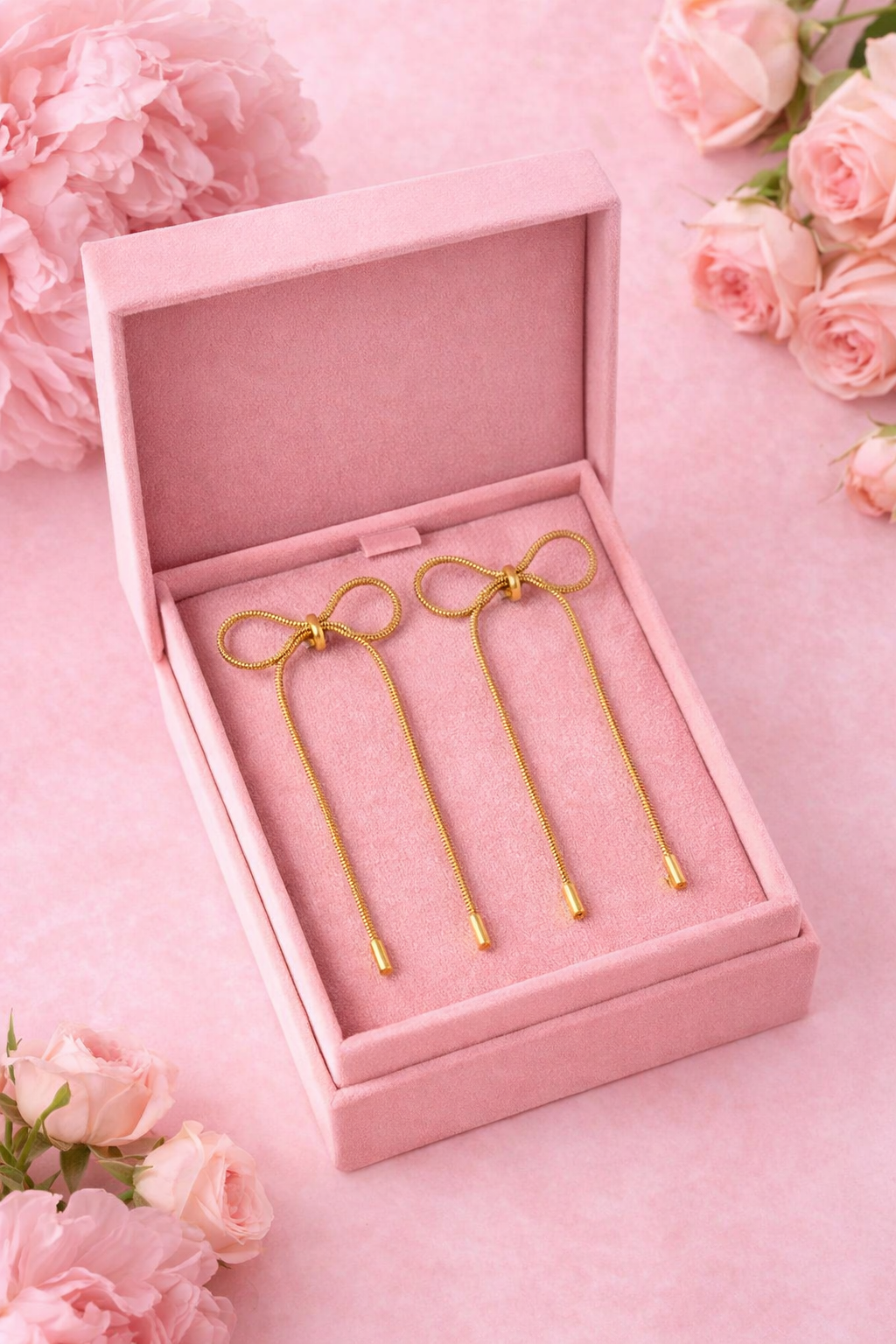 Serpent Glow Bow Earrings