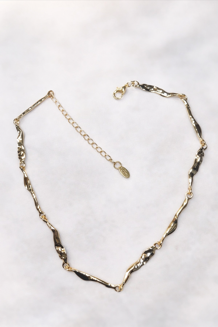 Elegant Twisted Gold Necklace