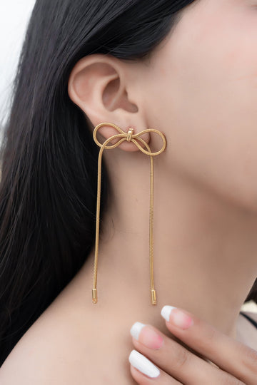 Serpent Glow Bow Earrings