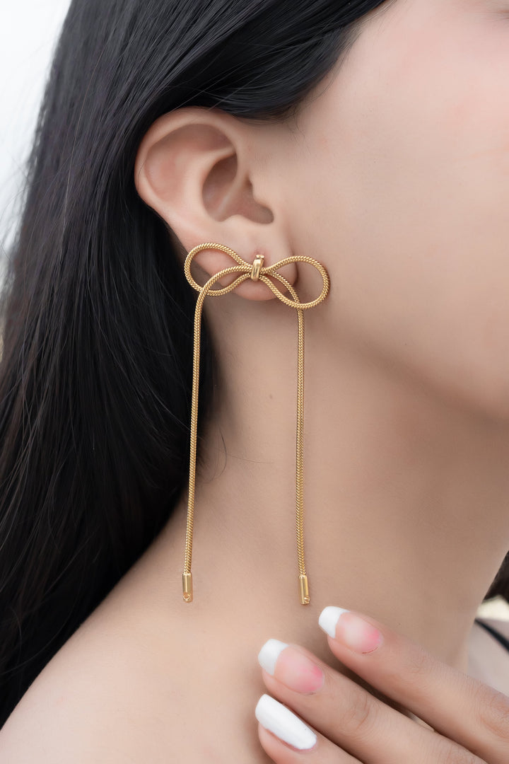 Serpent Glow Bow Earrings